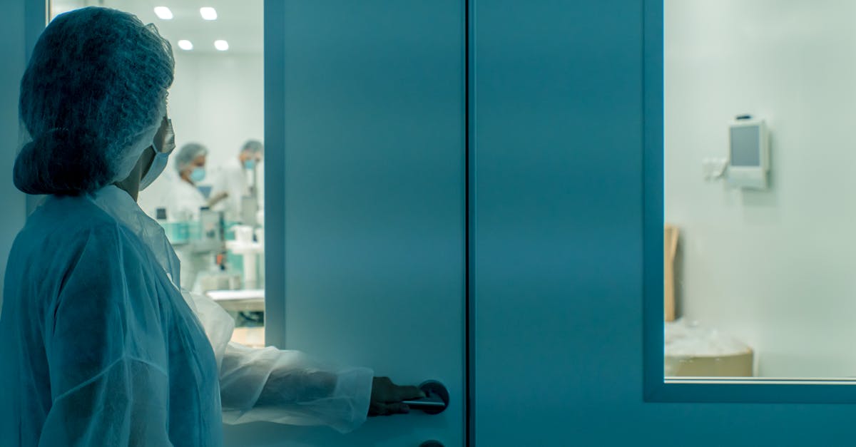 Doctor using a tablet to access electronic health records in a modern clinic.
