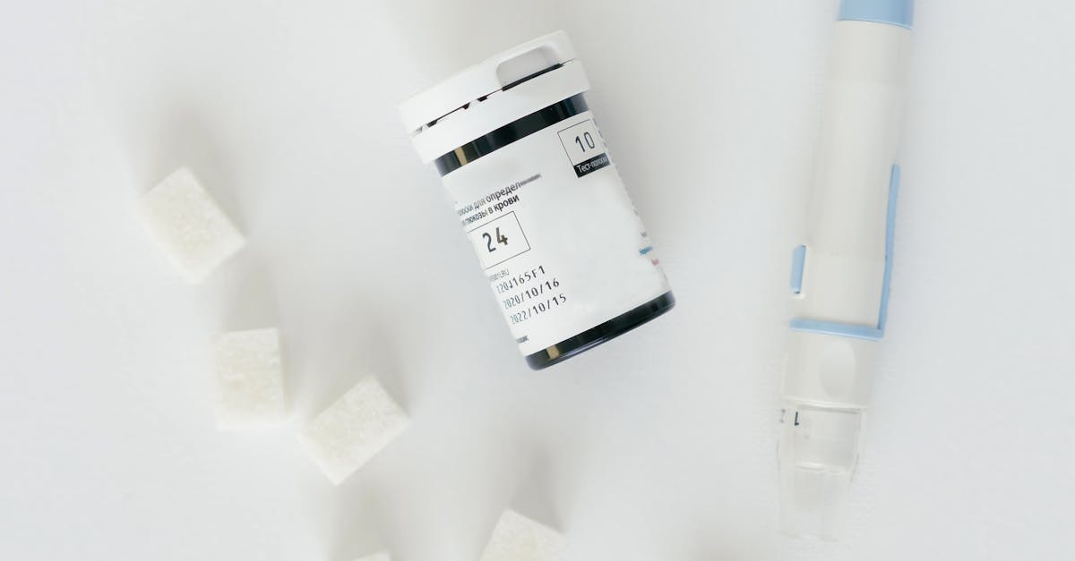 Pharmacist in a clinic using a barcode scanner to manage medication inventory on a shelf, ensuring efficient stock control.